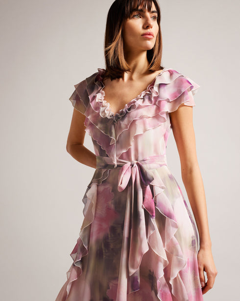 KARENIE-Dresses-The softest and most graceful maxi dress, KARENIE features a blurred floral print and finished with stunning waterfall frills that cascade down the front. Style yours with strappy sandals and minimal jewellery for an effortless look that will take you effortlessly through the season.The fabric of this product is made with 55% recycled polyester. Using recycled polyester helps divert plastic waste from ending in landfills, and helps us to reduce our dependence on virgin materials. Maxi dress